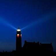 The Cocksdorp lighthouse at night, Texel, the Netherlands